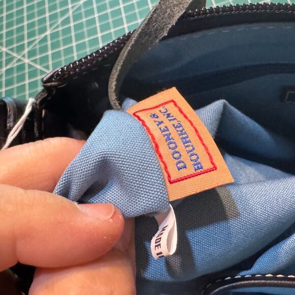 NWT Dooney & Bourke Mini East/West Slouch Handbag Black Multi-Logo Pattern Leath - Picture 7 of 12